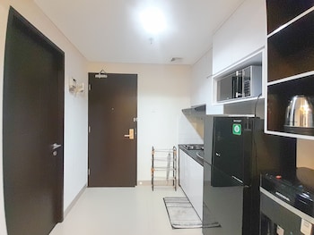 spacious and elegant 1br at patraland amarta apartment