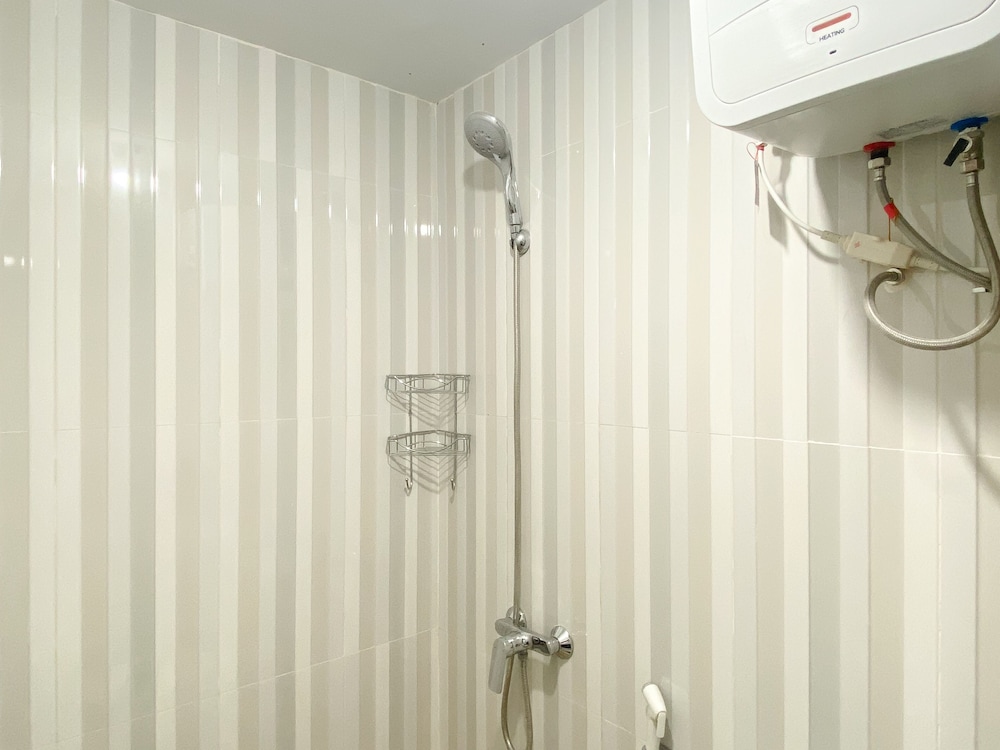 homey and compact studio at azalea suites apartment