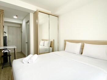 homey and compact studio at azalea suites apartment