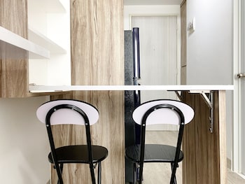 homey and compact studio at azalea suites apartment