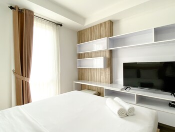 homey and compact studio at azalea suites apartment