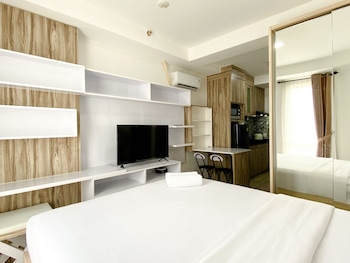 homey and compact studio at azalea suites apartment