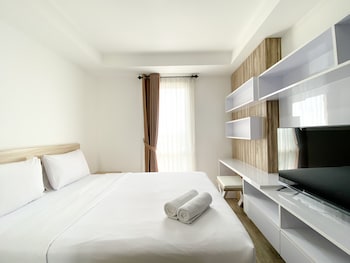 homey and compact studio at azalea suites apartment