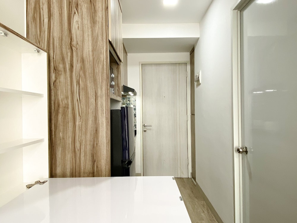 homey and compact studio at azalea suites apartment