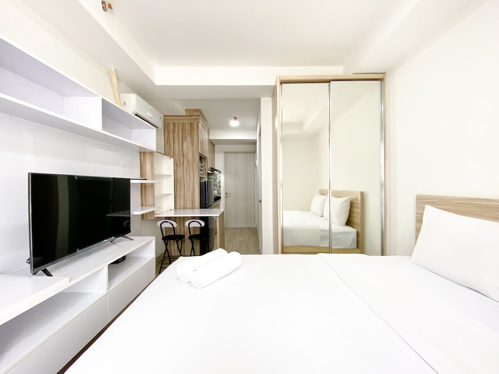 homey and compact studio at azalea suites apartment