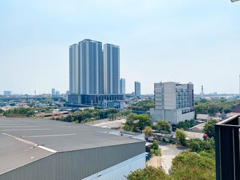 homey and compact studio at azalea suites apartment