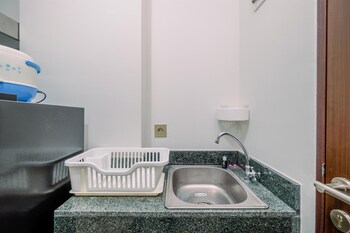 comfy and modern studio transpark cibubur apartment