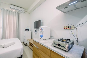 comfy and modern studio transpark cibubur apartment