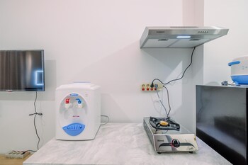 comfy and modern studio transpark cibubur apartment