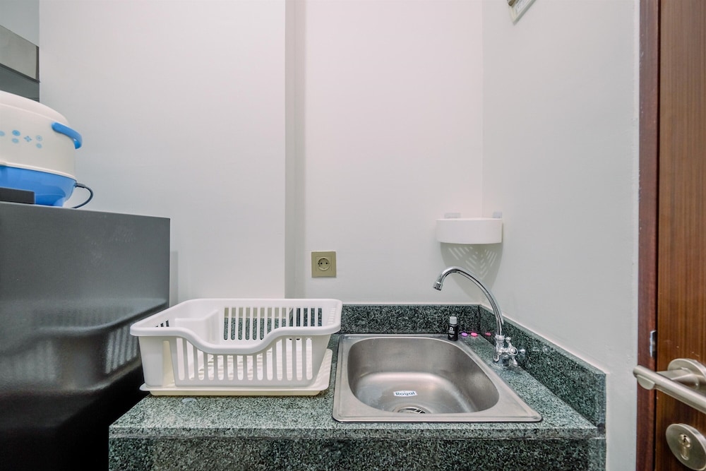 comfy and modern studio transpark cibubur apartment