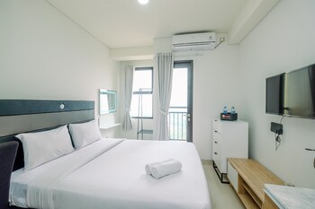 comfy and modern studio transpark cibubur apartment