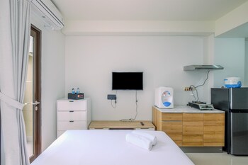 comfy and modern studio transpark cibubur apartment