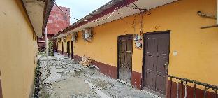 oyo 93295 wisma aluh ambak