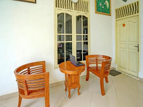 oyo 93295 wisma aluh ambak