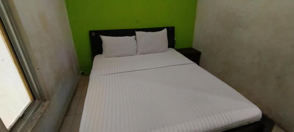 oyo 93295 wisma aluh ambak