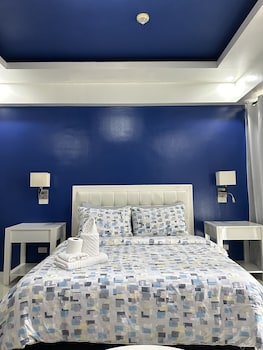 one palm tree villas across naia t3