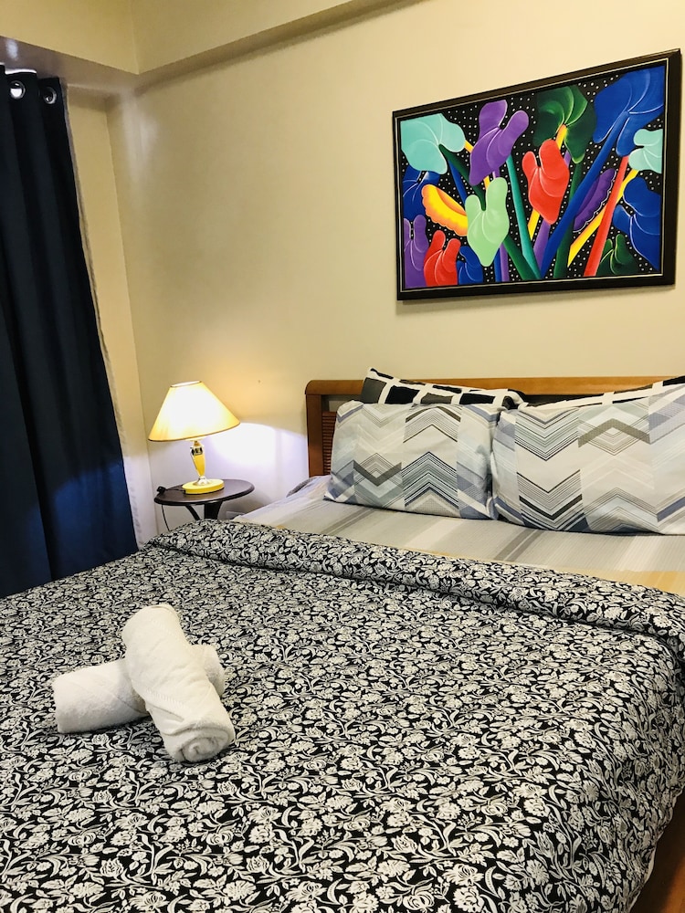 one palm tree villas across naia t3