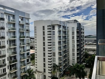 one palm tree villas across naia t3