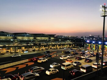 one palm tree villas across naia t3