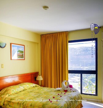 nueva toledo suites and hotel