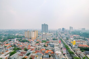 minimalist studio at evenciio margonda apartment