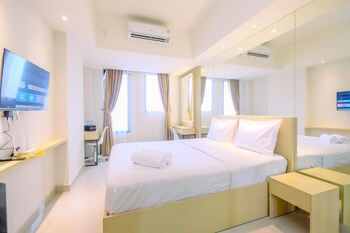 minimalist studio at evenciio margonda apartment