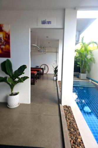 one world one home naiharn hotel