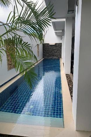 one world one home naiharn hotel