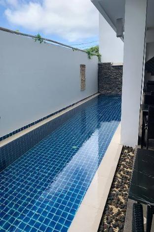 one world one home naiharn hotel