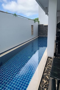 one world one home naiharn hotel