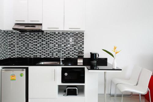 one world one home naiharn hotel