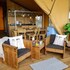 campsite combined tents with kitchen and bathroom located near a pond