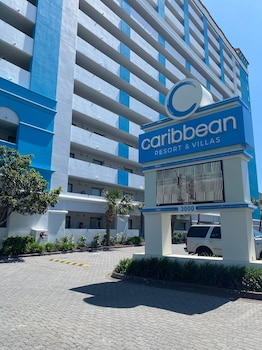 beach front condos located in the caribbean resort with pool and lazy river