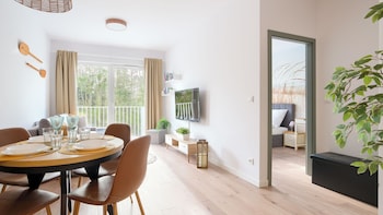 sun and snow lets sea baltic park