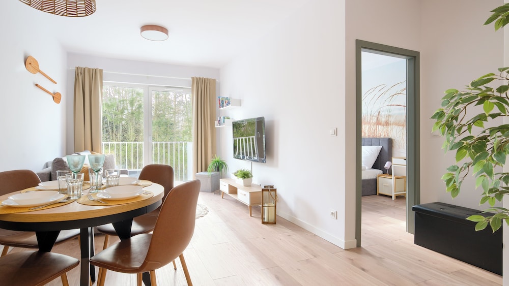 sun and snow lets sea baltic park