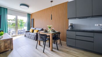 sun and snow lets sea baltic park