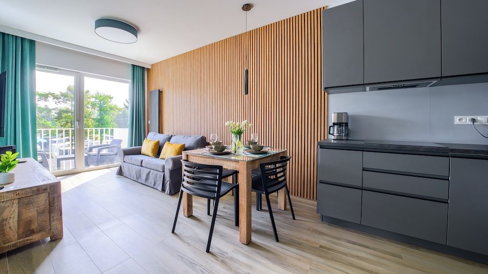 sun and snow lets sea baltic park