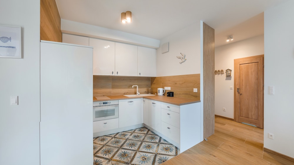 sun and snow lets sea baltic park