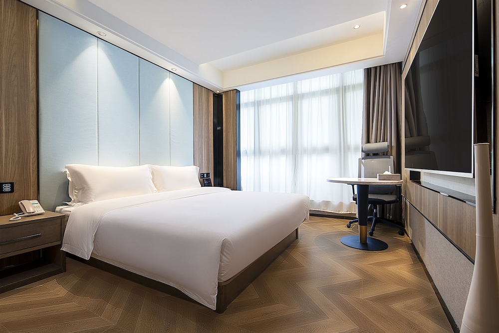 kunyixingguangjiudian