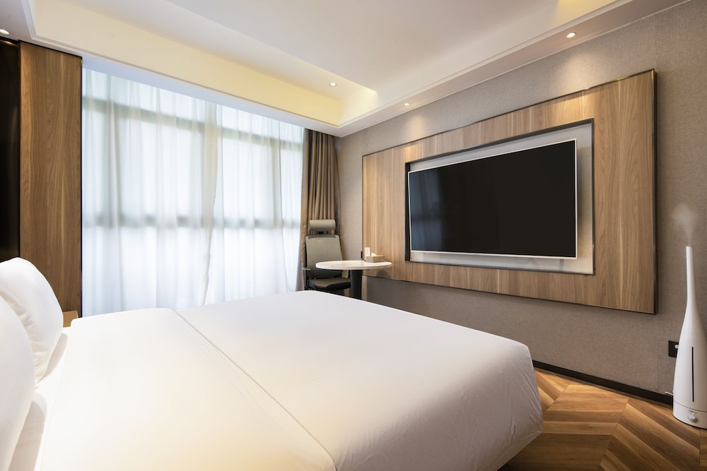 kunyixingguangjiudian