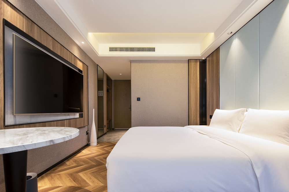 kunyixingguangjiudian