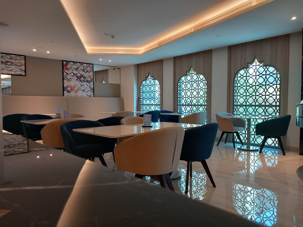 c hotel and suites doha