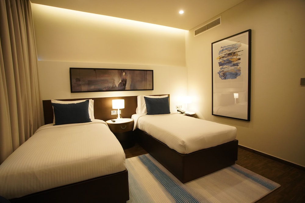 c hotel and suites doha