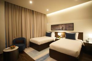 c hotel and suites doha