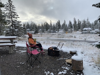 one hotel room with king bed and ac