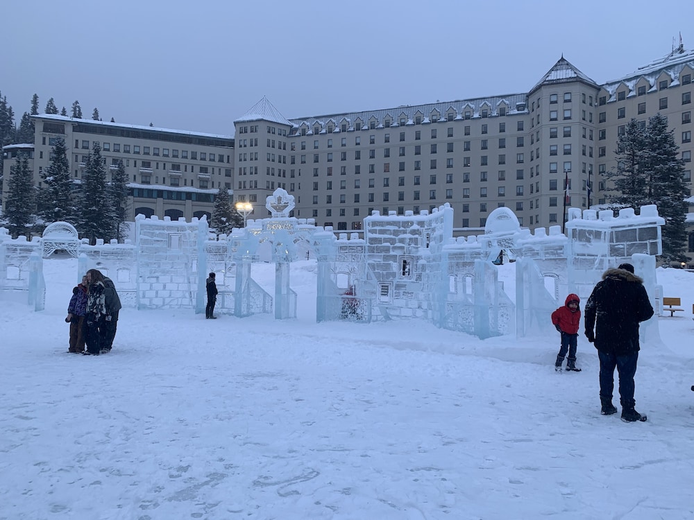 one hotel room with king bed and ac