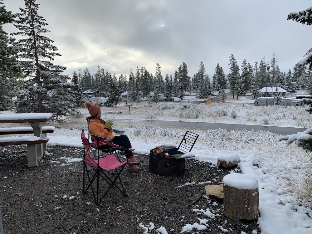 one hotel room with king bed and ac