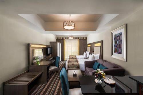 savoy central hotel apartments
