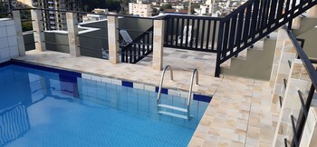 edificio com piscina 1 vaga garagem a 450m da praia enseada guaruja sp