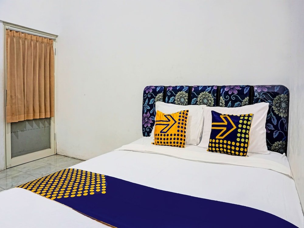 spot on 91718 kost damai syariah